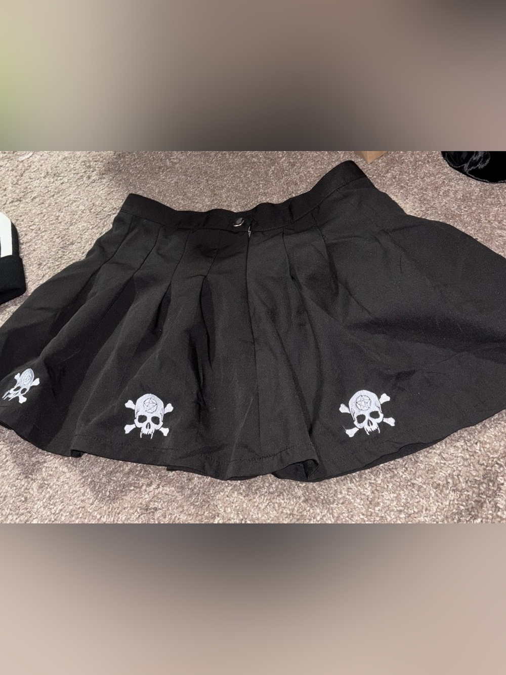 Dolls Kill Black Pleated Mini Skirt with White Skull Embroidery